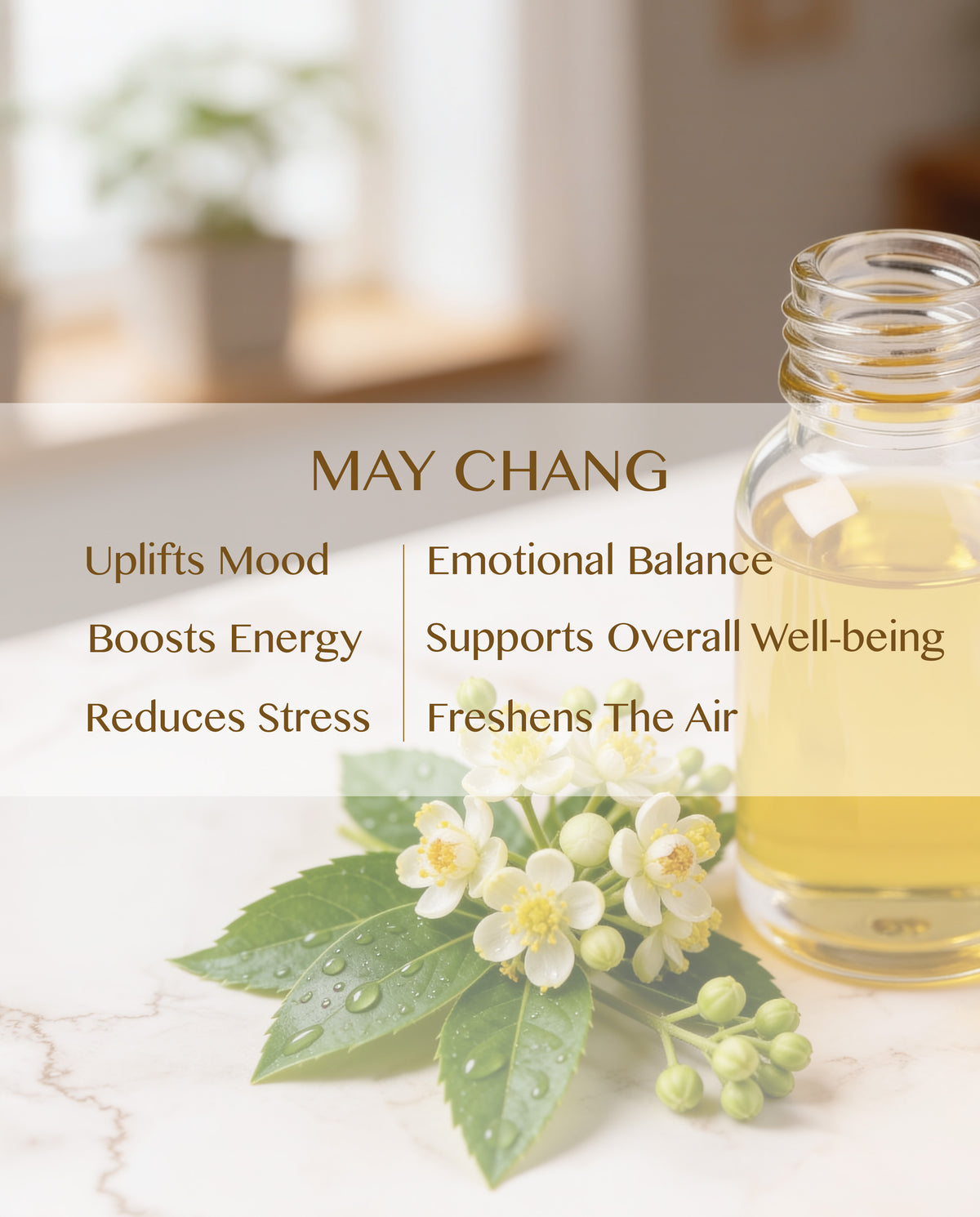 A clear glass bottle filled with pale yellow MAY CHANG essential oil sits on a light marble surface beside white flowers and green leaves. A semi-transparent text banner overlays the center with benefits for mood, energy, stress, and overall well-being.