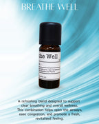 A pure essential oil blend, Breathe Well essential oil bottle centered on a blue and white abstract background with product text above and descriptive copy below.